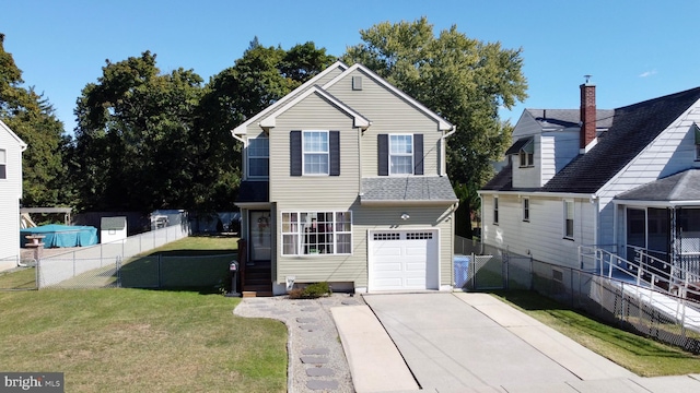 view of front facade with a garage and a front yard