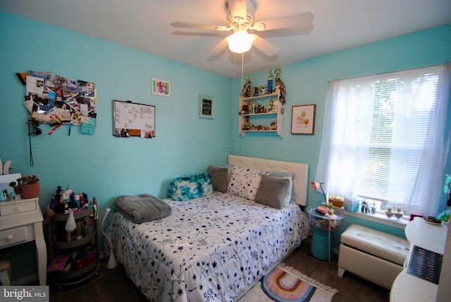 carpeted bedroom with ceiling fan