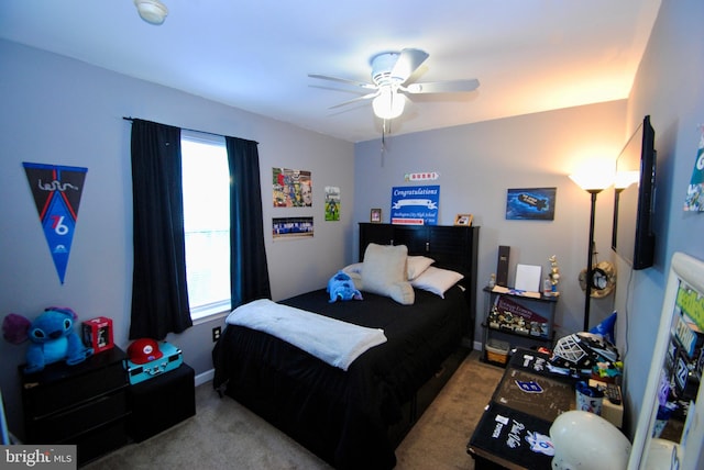 bedroom with ceiling fan and light colored carpet