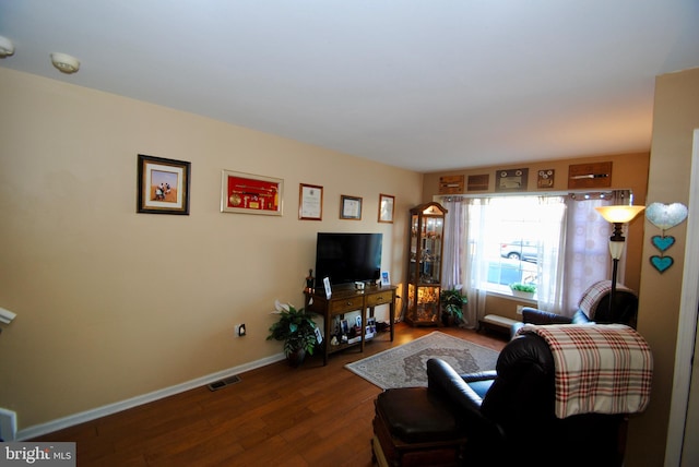 living room with wood-type flooring