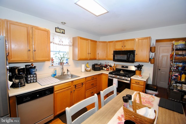 kitchen featuring appliances with stainless steel finishes and sink