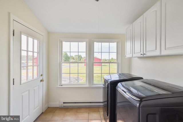333 Carter Rd, Princeton, NJ 08540 - laundry room with baseboard heating, cabinet space, washing machine and dryer, and light tile patterned floors