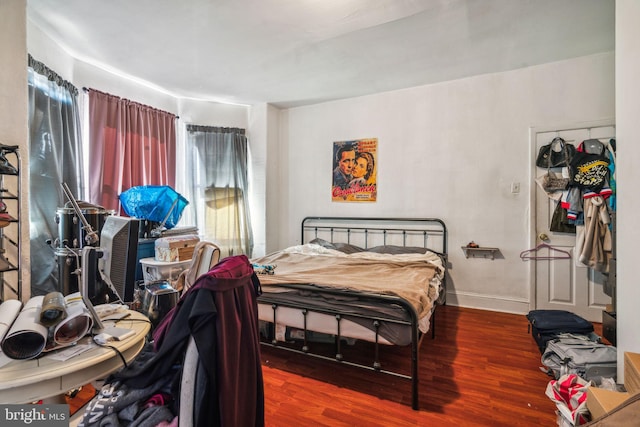 bedroom featuring wood-type flooring