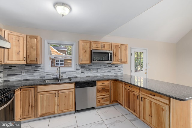 273 Four Seasons Dr, Drums, PA 18222 - kitchen featuring a sink, appliances with stainless steel finishes, a peninsula, decorative backsplash, and marble finish floor