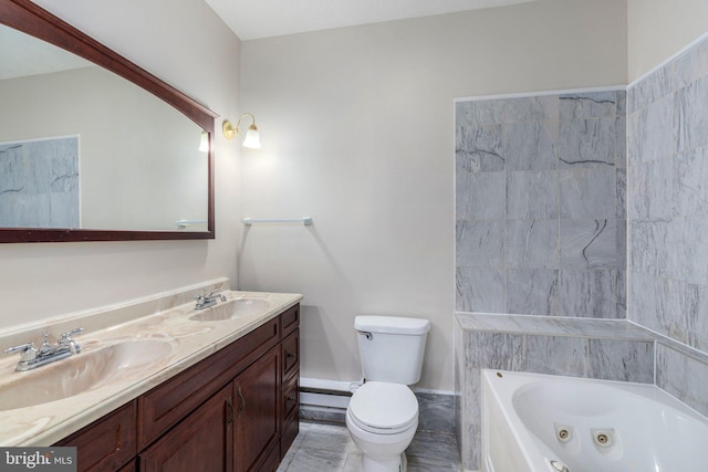 273 Four Seasons Dr, Drums, PA 18222 - bathroom featuring toilet, a jetted tub, double vanity, and a sink