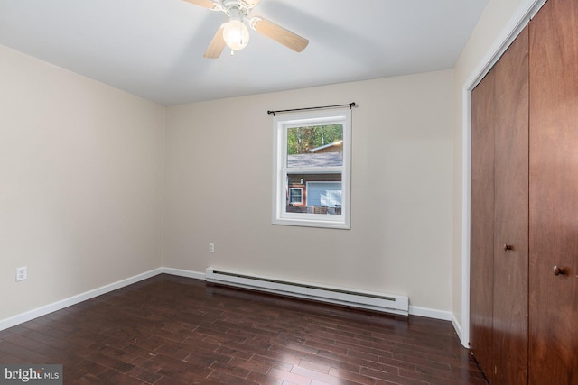 273 Four Seasons Dr, Drums, PA 18222 - unfurnished bedroom featuring a baseboard radiator, a closet, wood finished floors, and baseboards