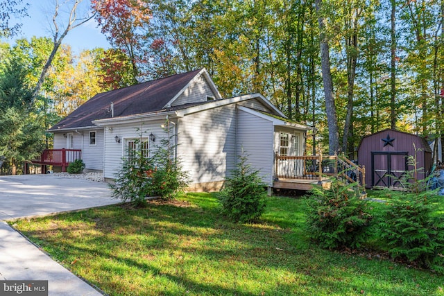 273 Four Seasons Dr, Drums, PA 18222 - view of property exterior featuring a yard, a shed, a deck, and an outdoor structure