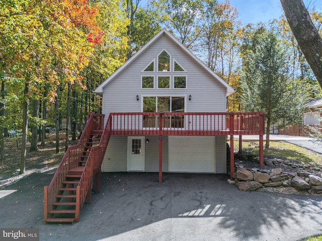 273 Four Seasons Dr, Drums, PA 18222 - view of front of house with driveway, a deck, a garage, and stairs
