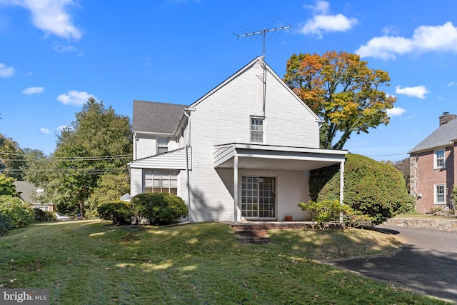 exterior space with a front yard