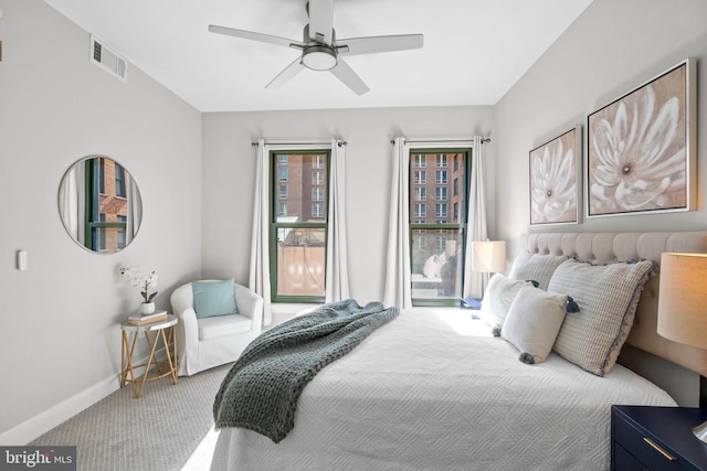 bedroom with ceiling fan and carpet