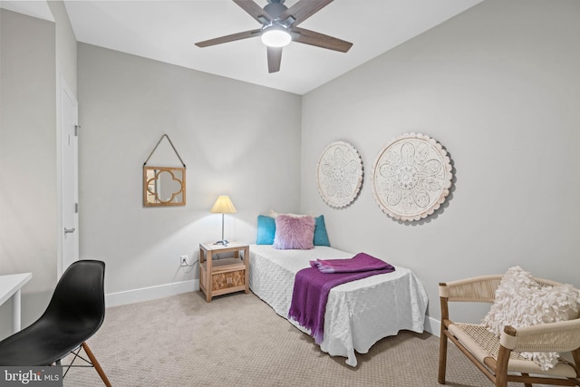 carpeted bedroom featuring ceiling fan and lofted ceiling