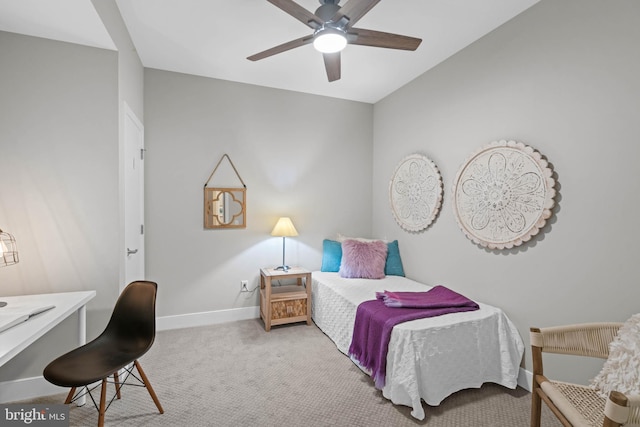 carpeted bedroom with ceiling fan and lofted ceiling