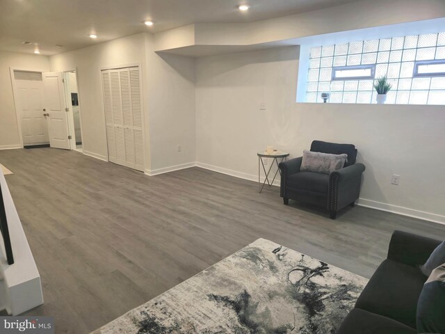 living area featuring dark hardwood / wood-style flooring