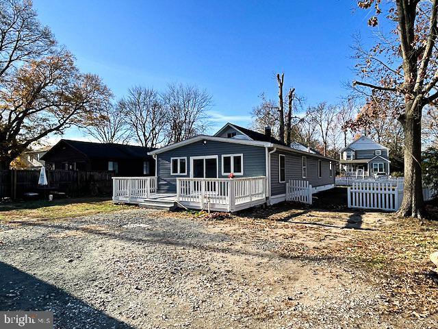 view of front of house with a deck