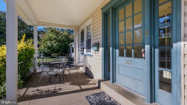 property entrance with a porch