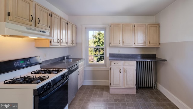 kitchen featuring sink, radiator heating unit, white gas range oven, and dishwasher