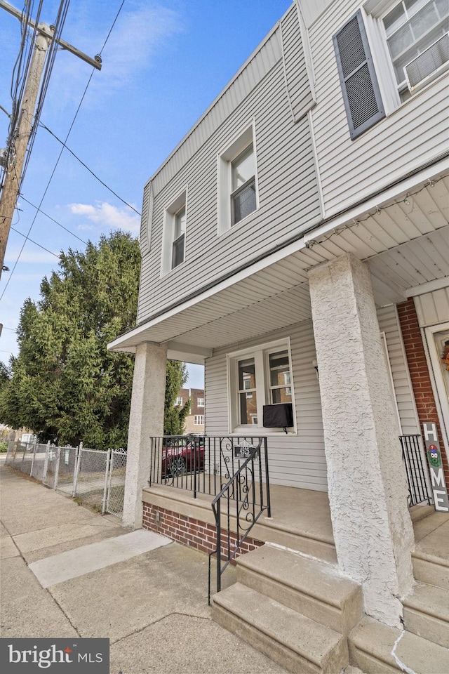 doorway to property with a porch