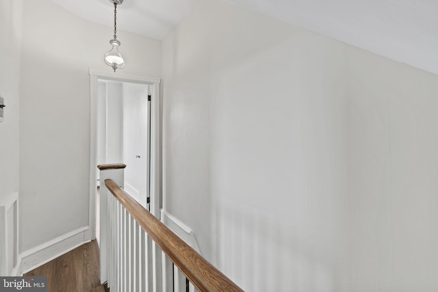 hall with wood-type flooring