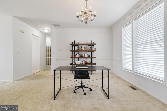 carpeted home office with a notable chandelier and ornamental molding