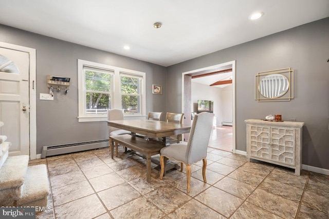 dining area featuring baseboard heating