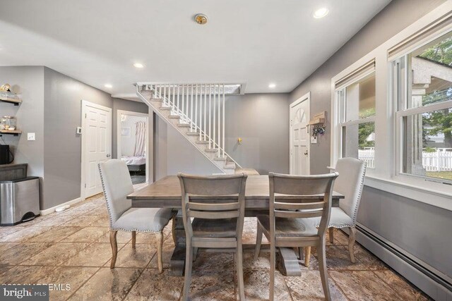 dining space featuring a baseboard radiator