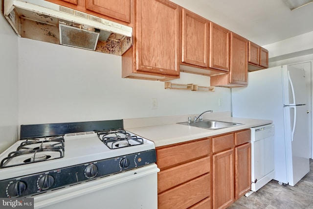 kitchen with white appliances and sink