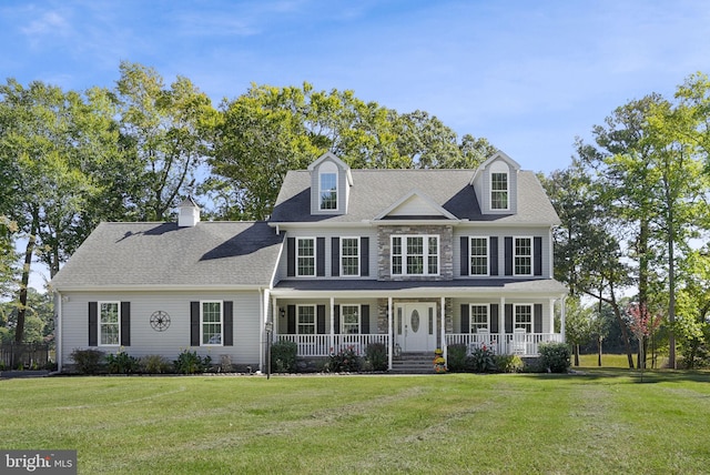 view of front of property featuring a porch and a front lawn