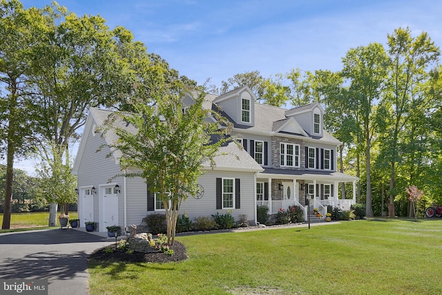 view of front of property featuring a front lawn and covered porch