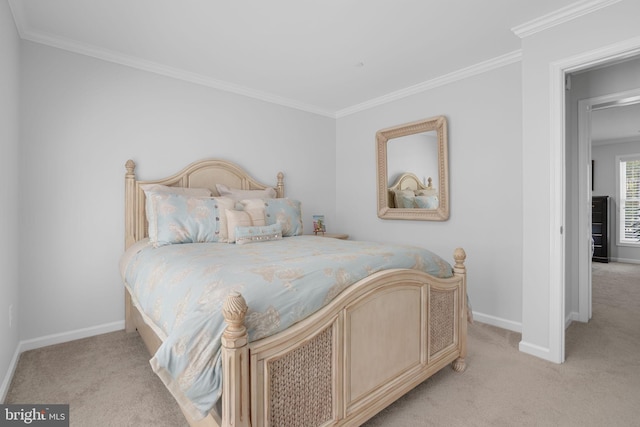 carpeted bedroom with crown molding