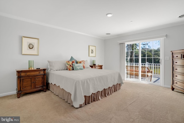 carpeted bedroom with crown molding and access to outside