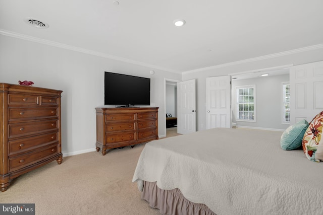 bedroom with light carpet and crown molding