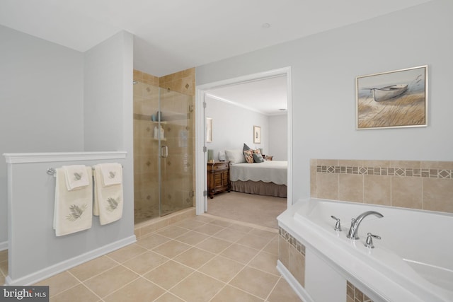 bathroom featuring shower with separate bathtub and tile patterned flooring