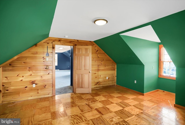 bonus room featuring vaulted ceiling