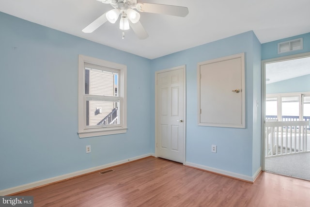 unfurnished bedroom featuring light hardwood / wood-style floors and ceiling fan