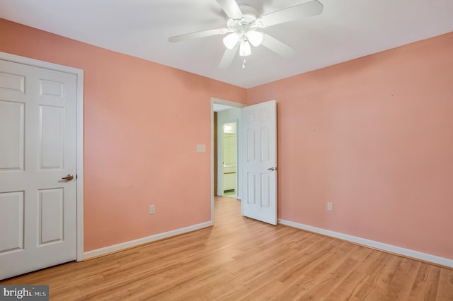 unfurnished bedroom with light hardwood / wood-style flooring and ceiling fan