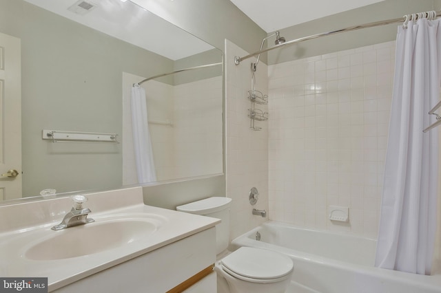 full bathroom with vanity, toilet, and shower / bath combination with curtain