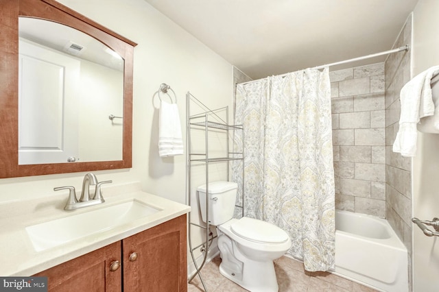 full bathroom with shower / tub combo with curtain, vanity, toilet, and tile patterned flooring