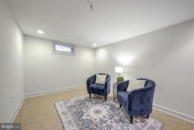 living area featuring light tile patterned floors