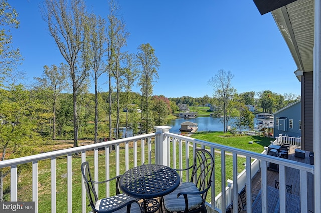 balcony featuring a water view