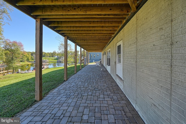 view of patio / terrace with a water view