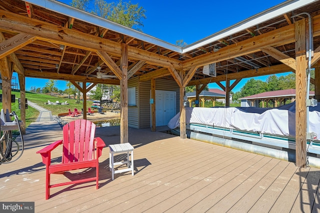 dock area featuring a wooden deck and a gazebo