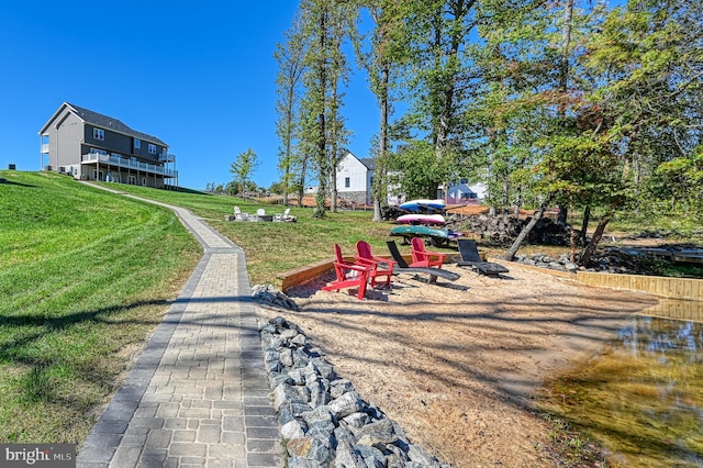 surrounding community featuring a lawn