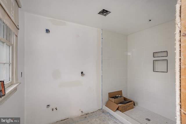 bathroom with a shower