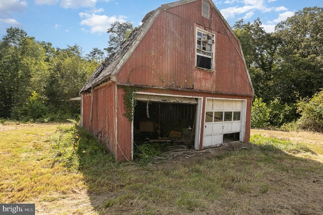 view of outbuilding with a garage