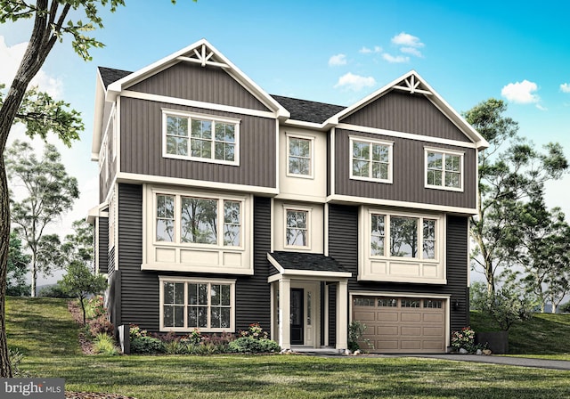 view of front of house featuring a garage and a front lawn