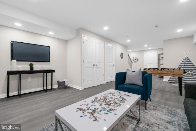 living room with wood-type flooring