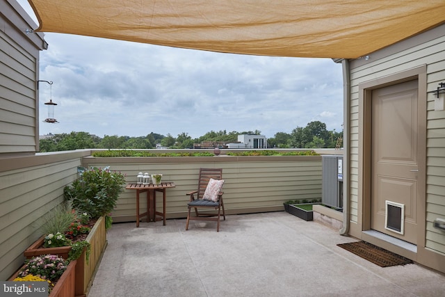 view of patio / terrace featuring a balcony