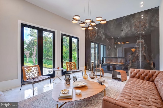 living room with a notable chandelier