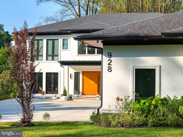 rear view of house featuring a patio