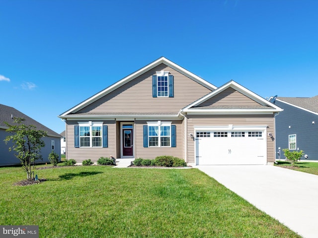 view of front facade featuring a front yard and a garage